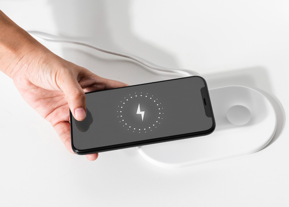 hand-connecting-smartphone-wireless-charger.jpg