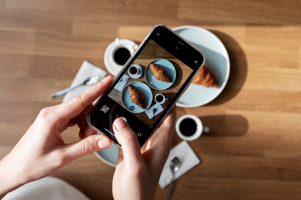 woman-taking-photo-two-croissants.jpg